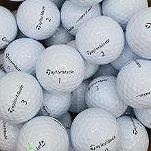 Collection of white Callaway golf balls showing various numbers and Callaway logo markings, arranged in a clustered pattern.