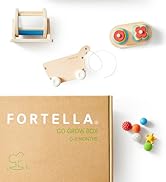 Assortment of wooden toys including colorful blocks, a small hammer, and a simple toolbox. Text 'Just Toys and Growth' visible above toys.