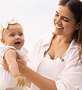 S32 Wearable Breastpump advertisement highlighting hands-free, portable, and multifunctional features. Partial view of a circular device shown.