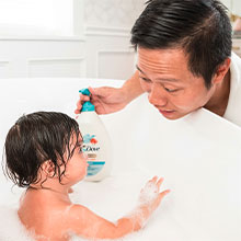 Baby Dove advertisement showing company logo and text about partnering with Postpartum Support International for maternal mental health support.