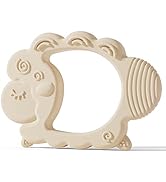 Series of decorative architectural moldings or trim pieces in cream or off-white color, showing scrolling and curved designs in a classical style.
