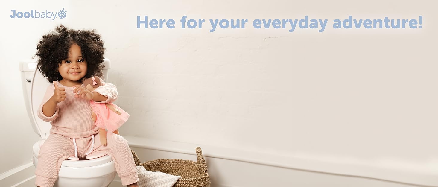 Interior room setting with Joolbaby logo and text 'Here for your everyday adventure!' displayed against a neutral wall with woven basket visible.
