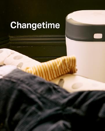 Multiple views of a white plastic breast pump funnel component, showing different angles of the cone-shaped milk collection device.