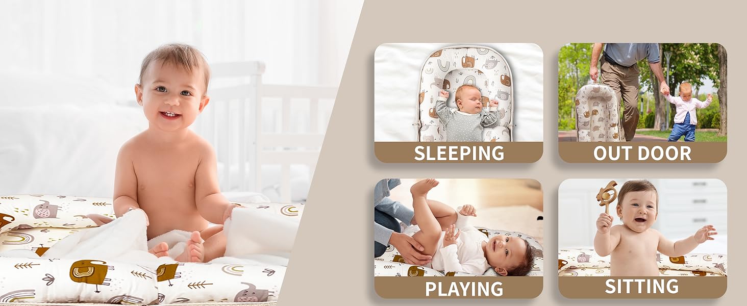 Infant lounger with cream-colored fabric featuring cute elephant and rainbow prints. U-shaped design with raised edges for baby comfort and safety.