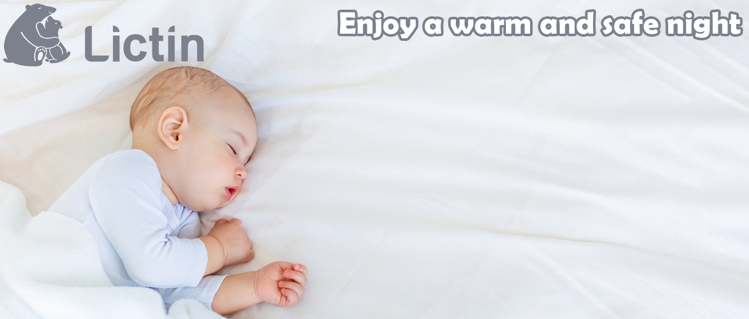 a baby sleeping on a bed with a message