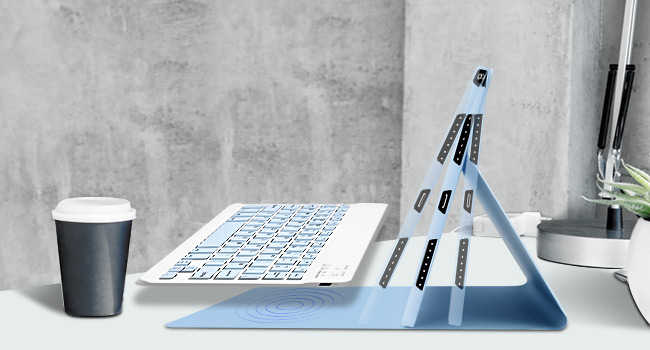 Close-up of a white keyboard with USB connection port, showing detailed view of keys and connectivity.