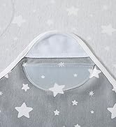 Gray and white textile fabric with repeating star pattern, shown in flowing waves to display material texture.