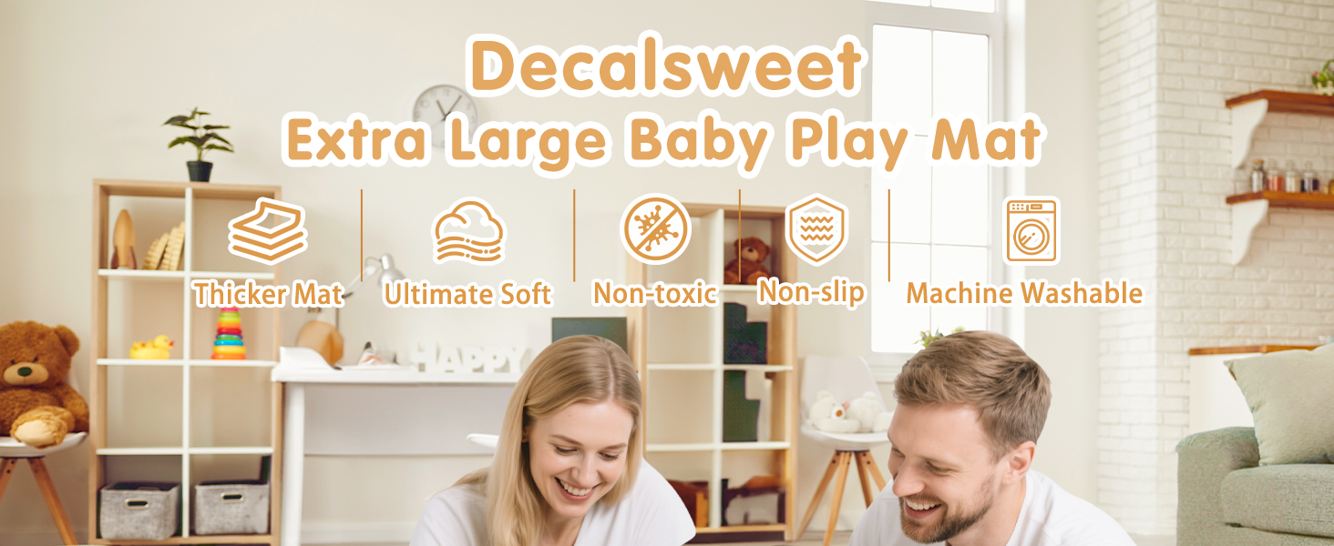 Text reads 'Decalsweet Extra Large Baby Play Mat'. Interior room setting with wooden shelving and natural lighting
