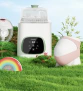 Outdoor scene with hot air balloon, backpack, and small white electronic device on grassy field.