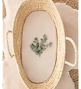 Square cushion or pad shown from multiple angles with decorative rope or braided trim around edges, in peach or salmon color.