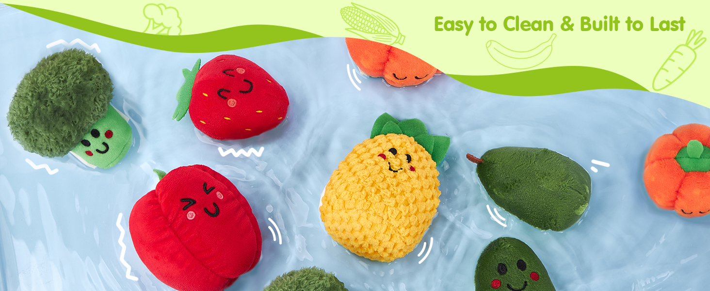 Text reads 'Easy To Clean & Built To Last'. Colorful produce-themed kitchen accessories or decorations featuring red, yellow and green designs on blue background.