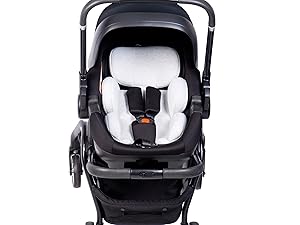 Black infant car seat shown from multiple angles, featuring adjustable headrest, side impact protection, and installation system components.