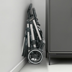 Close-up sequence showing black mechanical components or parts being assembled or adjusted, possibly part of a larger device or mechanism.