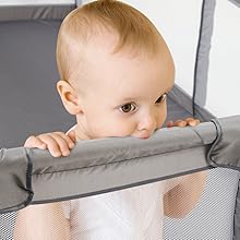 Text reads: 'TRANSPARENT STORAGE BAG'. Clear storage bag with mesh panels showing colorful plush toys inside, mounted under what appears to be furniture.