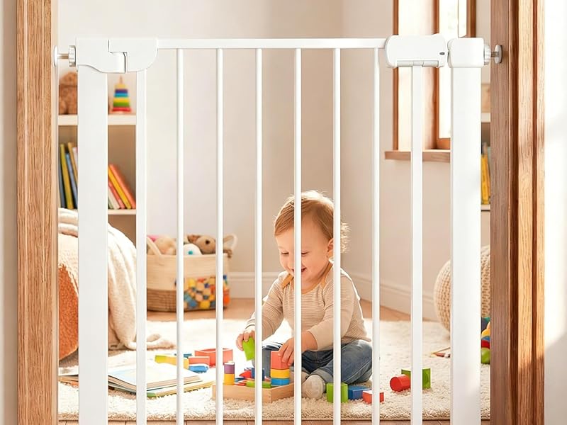 White safety gate installed in doorway or hallway opening. Shows gate in closed position within wooden door frame.