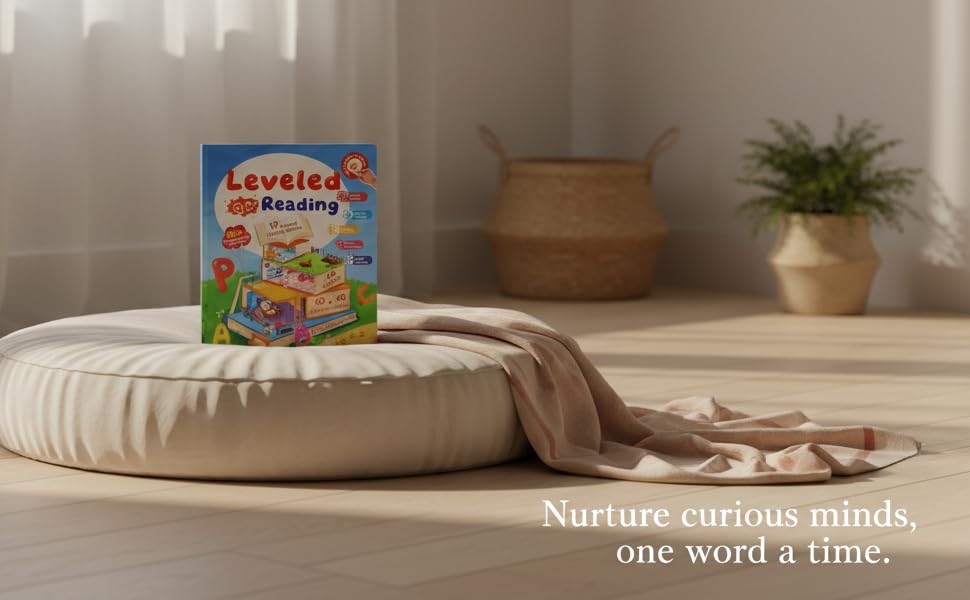 Toddler sitting on light carpet surrounded by pastel-colored floor cushions (green and yellow), engaged with picture book in bright, minimally decorated room with white curtains.
