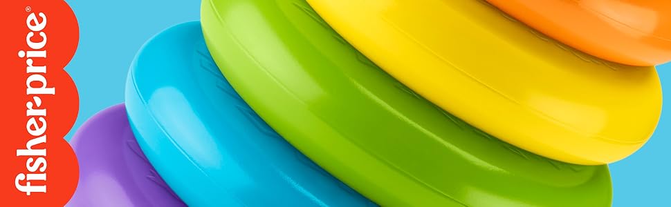 Close-up of curved rainbow-colored plastic or silicone strips arranged in parallel.