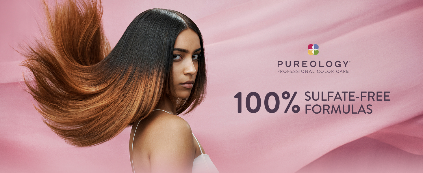 Text reads 'PUREOLOGY' and '100% SULFATE-FREE FORMULAS'. Woman with long flowing dark and golden-brown hair on pink background.