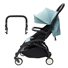 Product safety diagram showing incorrect stroller strap placement with a red X mark, alongside image of compact black stroller.
