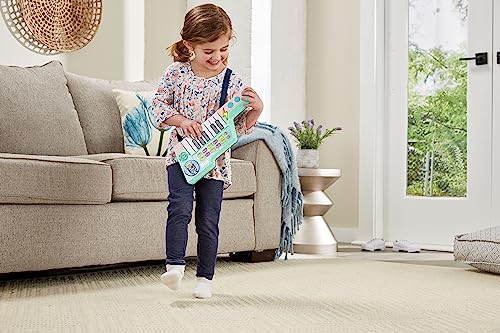 shoulder strap and volume control. Ages 3-6